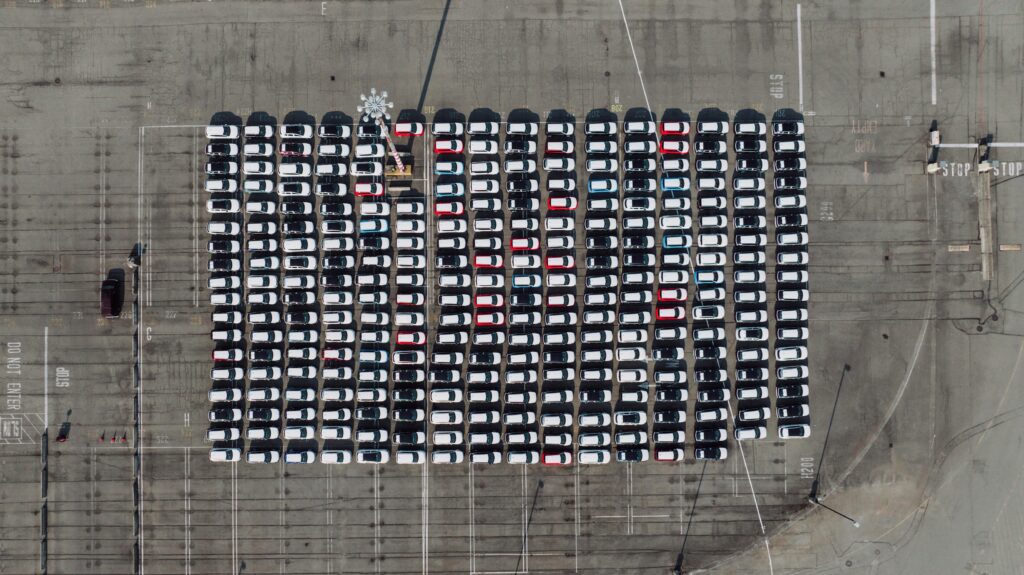pexels-photo-28374669-28374669 Aerial shot of an organized parking lot filled with cars in Seattle, WA.